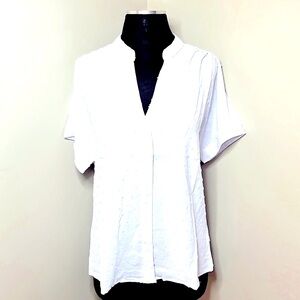 NWT white blouse with cute raised dot detail.  V-neck medium❣️